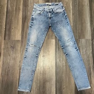 Guess distressed mid rise skinny jeans 25W
